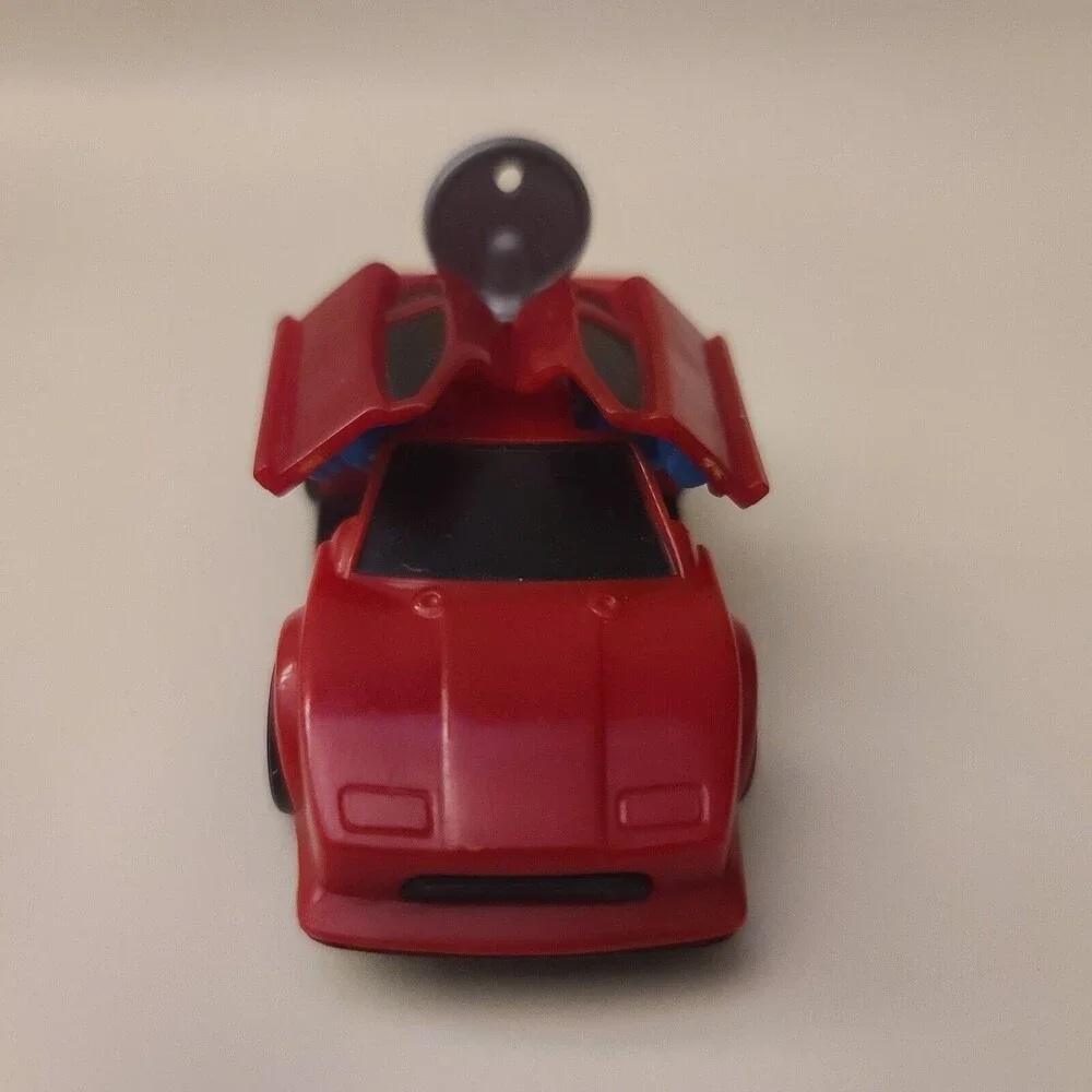 Vintage McDonald's Mattel Hot Wheels 1993 DeLorean Red Plastic Turn Key Car